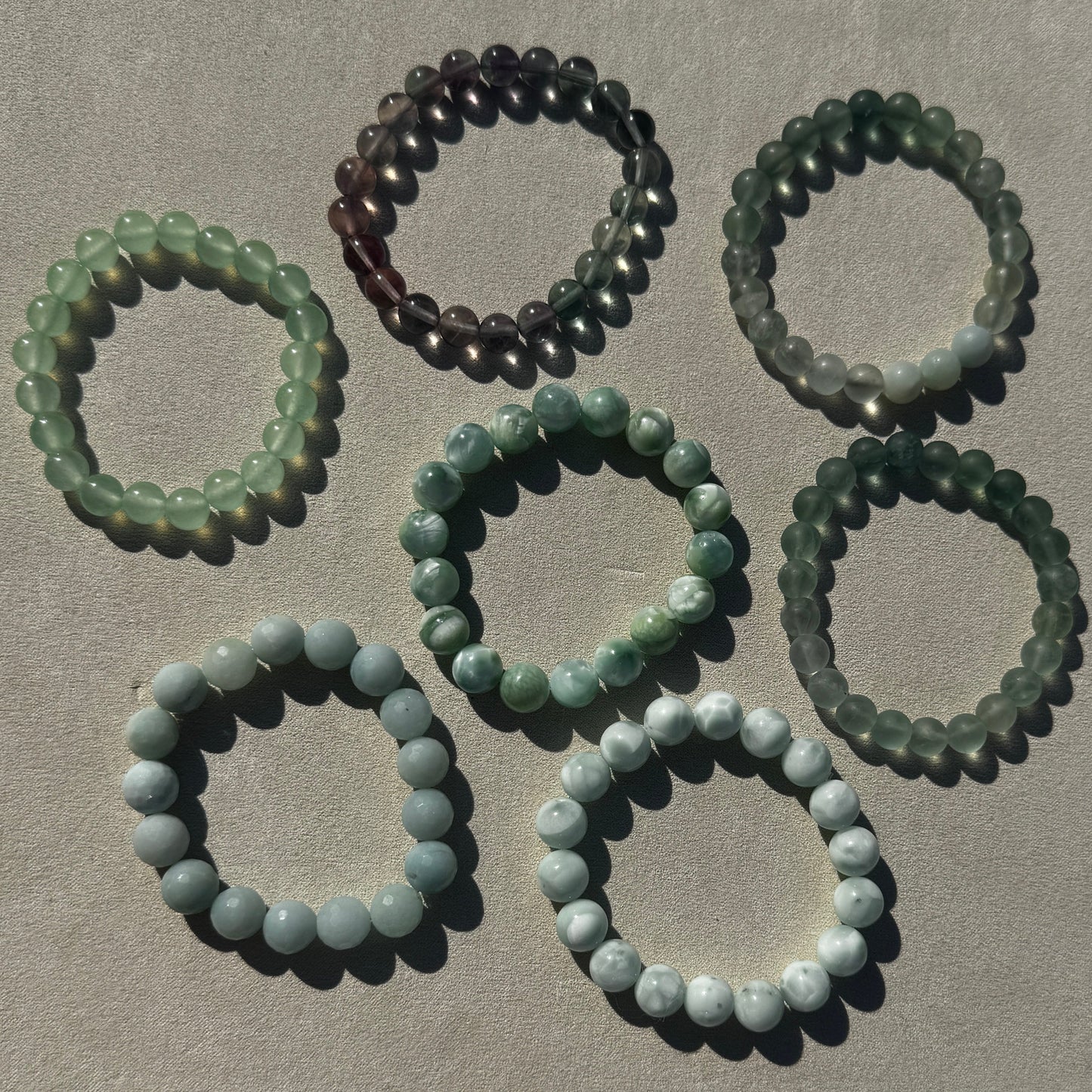 Sparkling Sea Smooth Stone Stretch Bracelets
